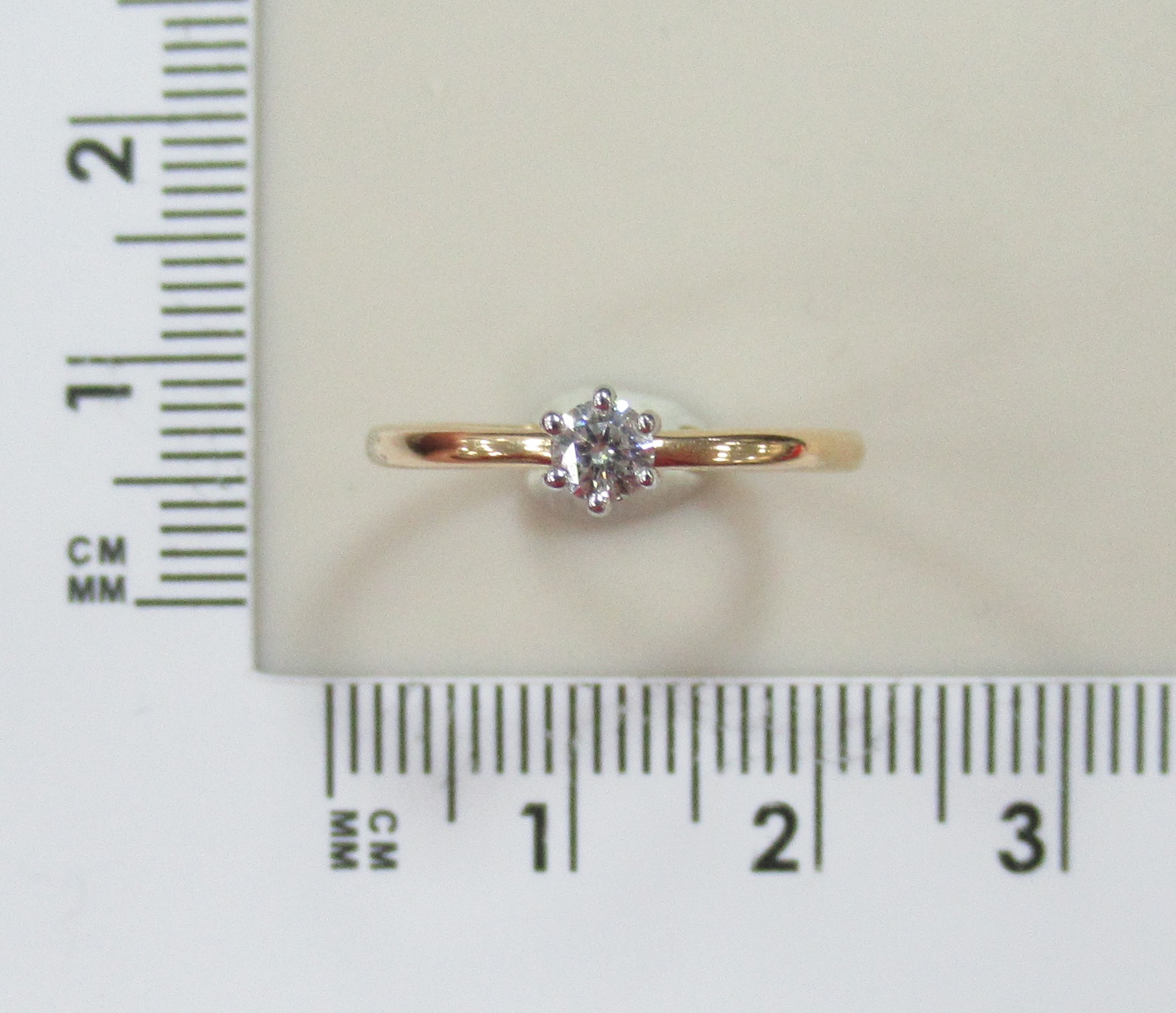 Золотое кольцо 585 пробы; родий; вставки 1 Бр.Кр-57 0,154 3/6А;